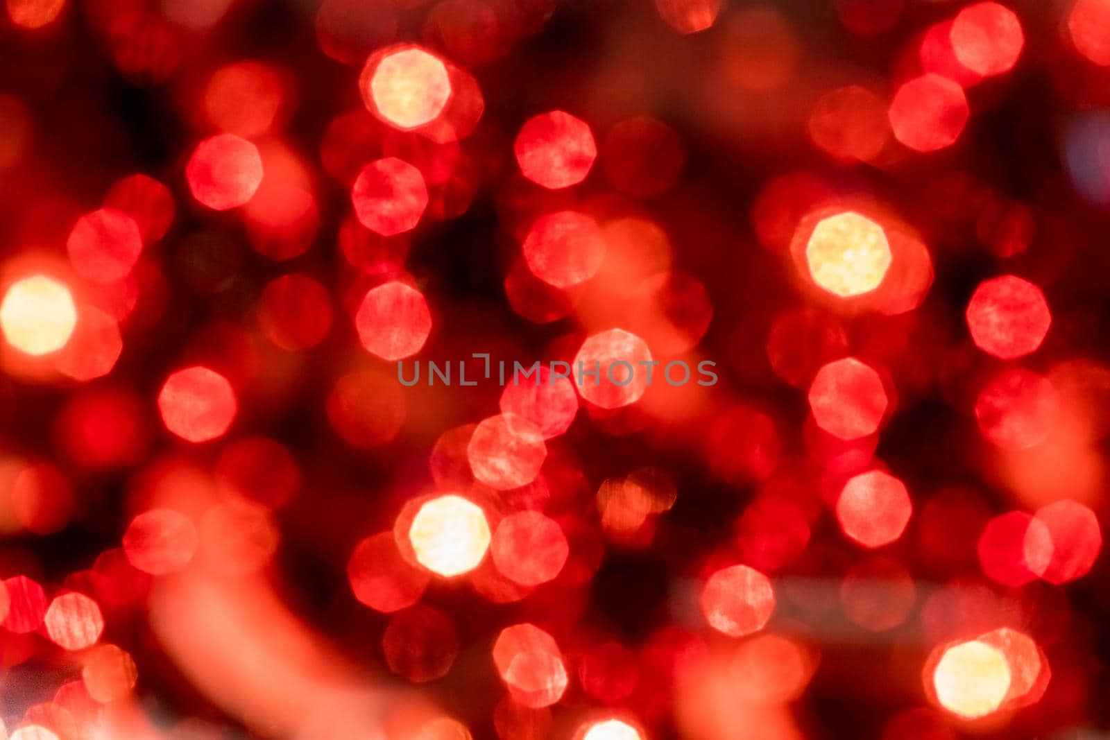 Abstract defocused blurred background. Festive background.red and white bokeh , christmas and happy new year banner. ad or postcard by YuliaYaspe1979