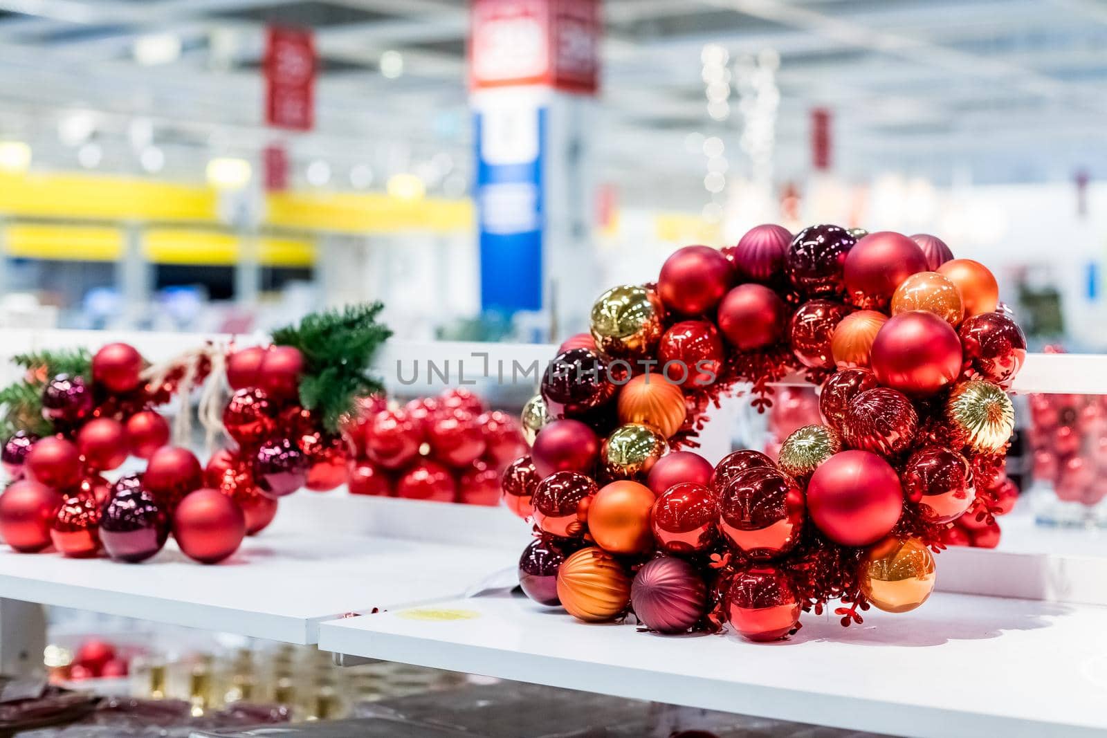 Holiday round frame, pattern made and gold glass Christmas balls