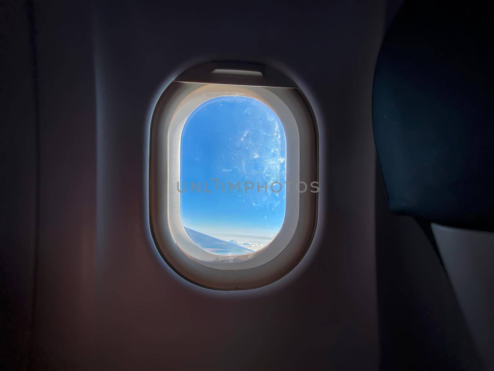 Clear sky seen from an airplane window during flight by rarrarorro