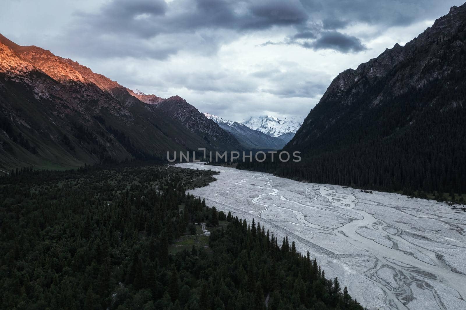 River and mountains at sunset. Shot in Xinjiang, China.