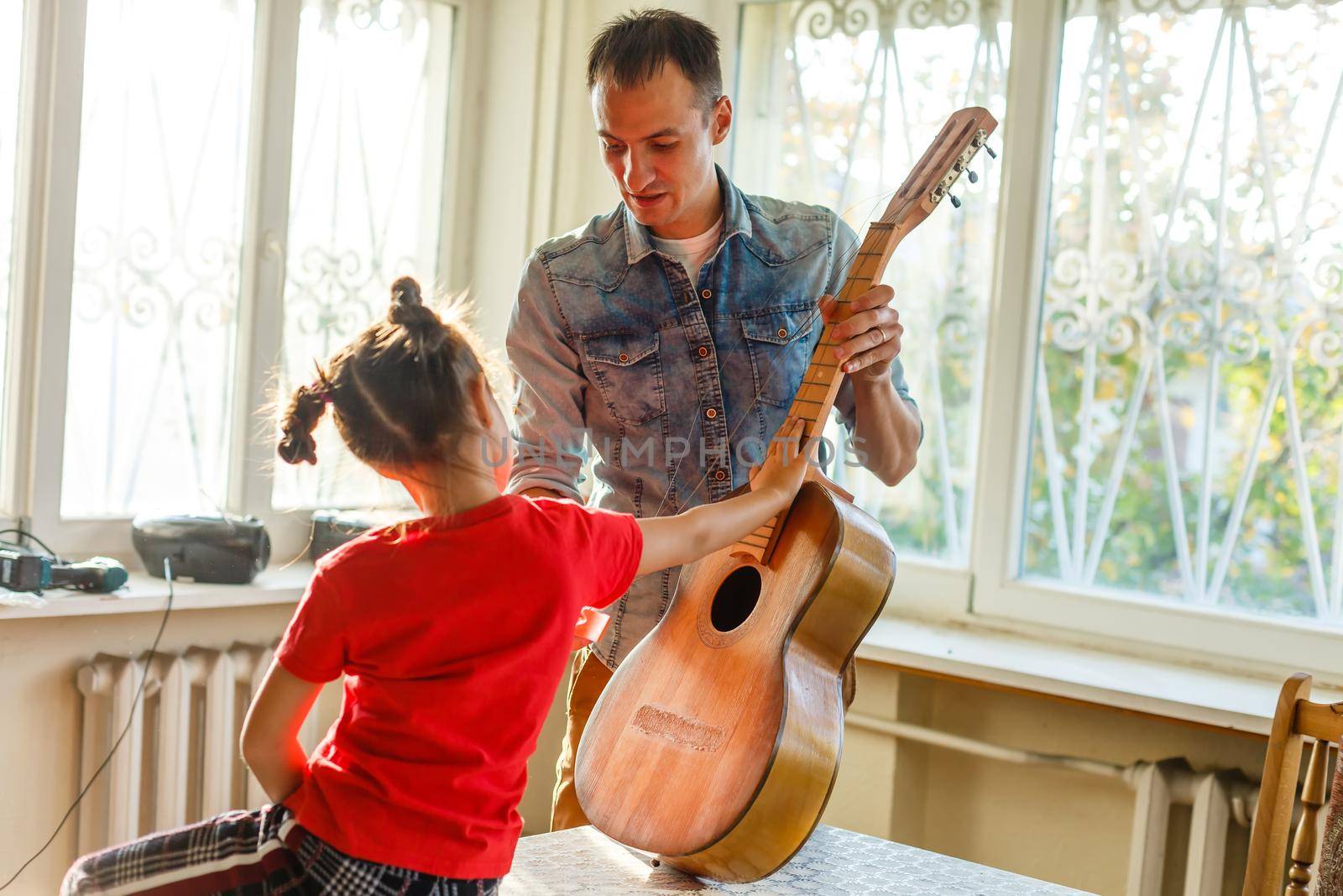 acoustic guitar stringing, to make a repair