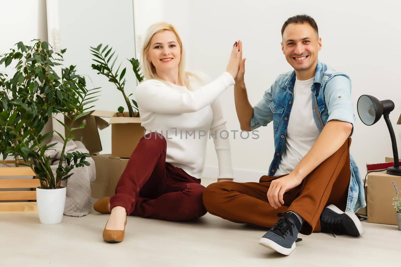 Happy young couple moving in new house