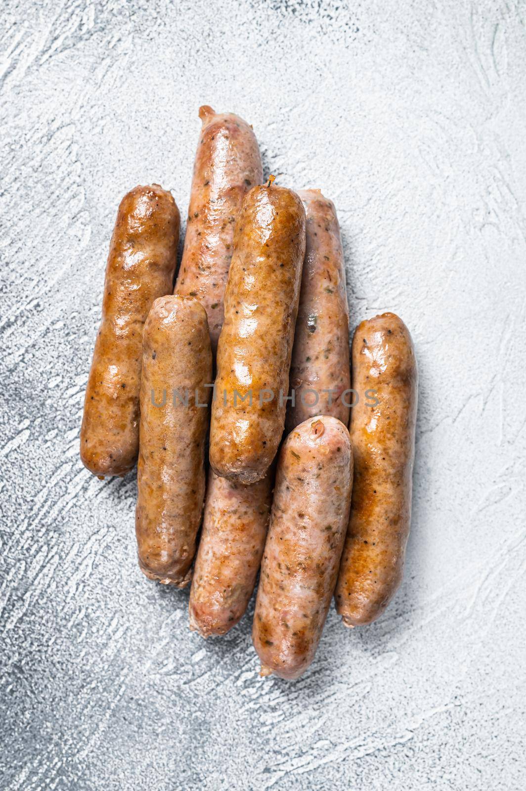 Roasted Bratwurst Hot Dog sausages. White background. Top View by Composter