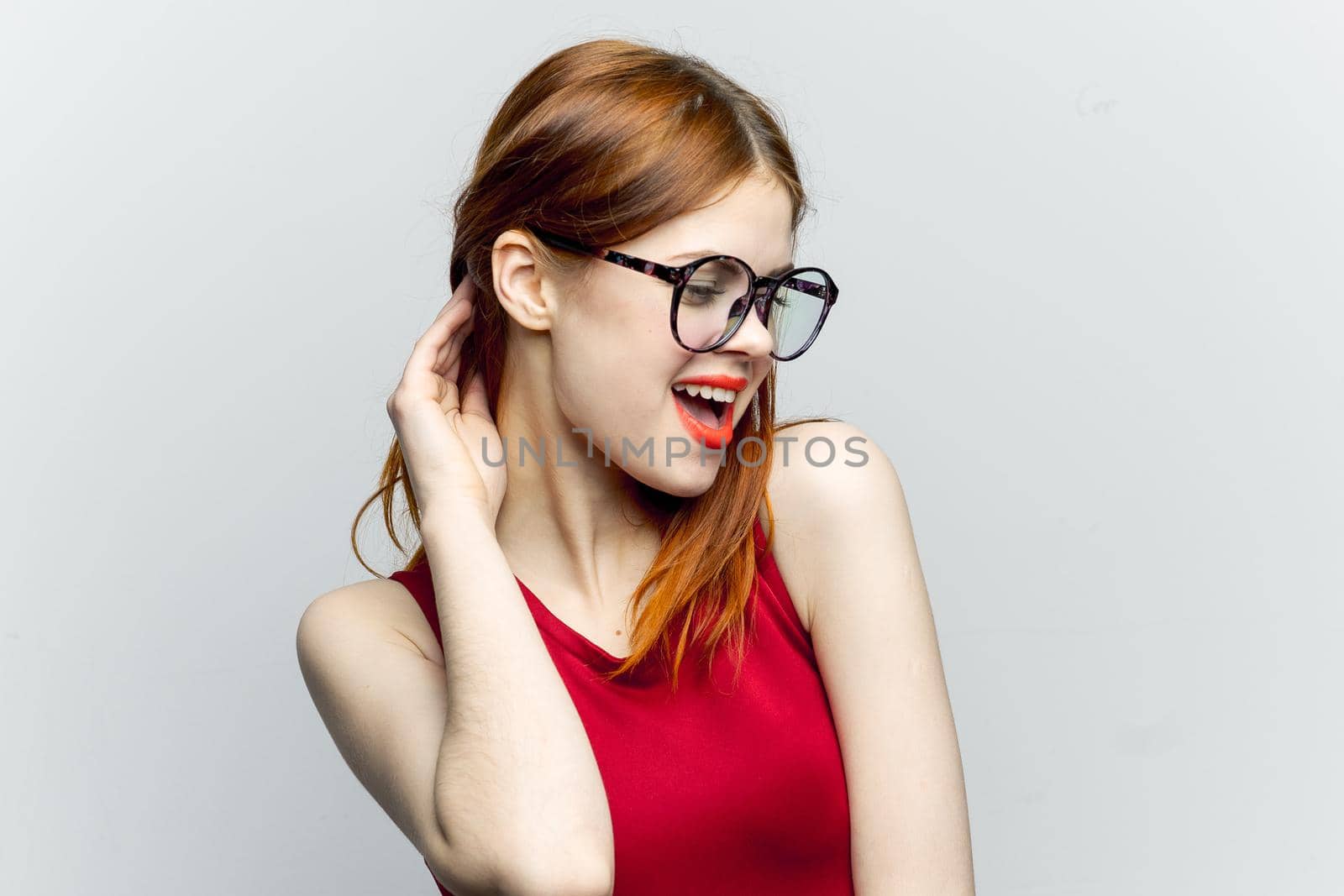 pretty woman in glasses with phone in hands communication technology by Vichizh