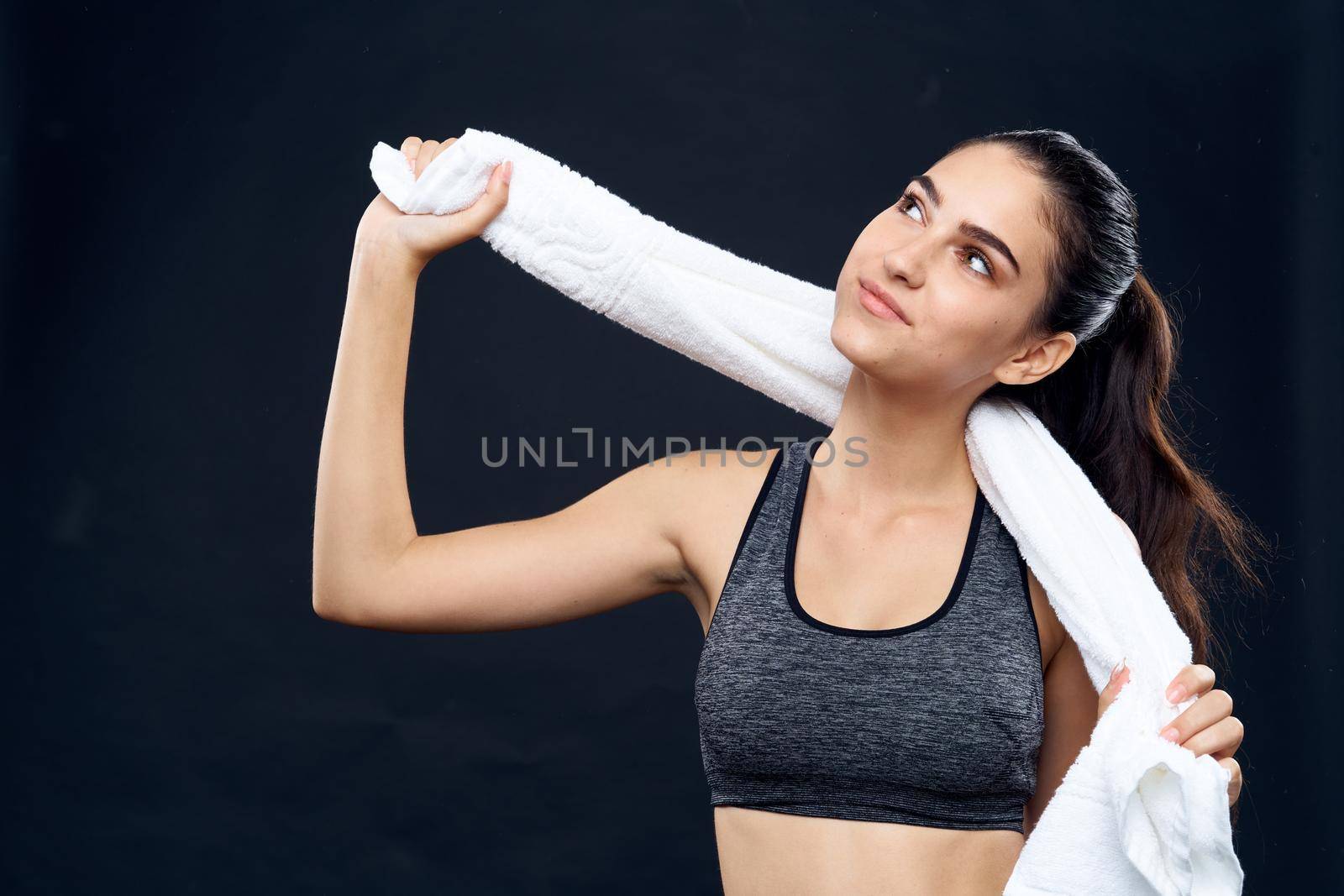 sports woman exercise fitness health dark background. High quality photo