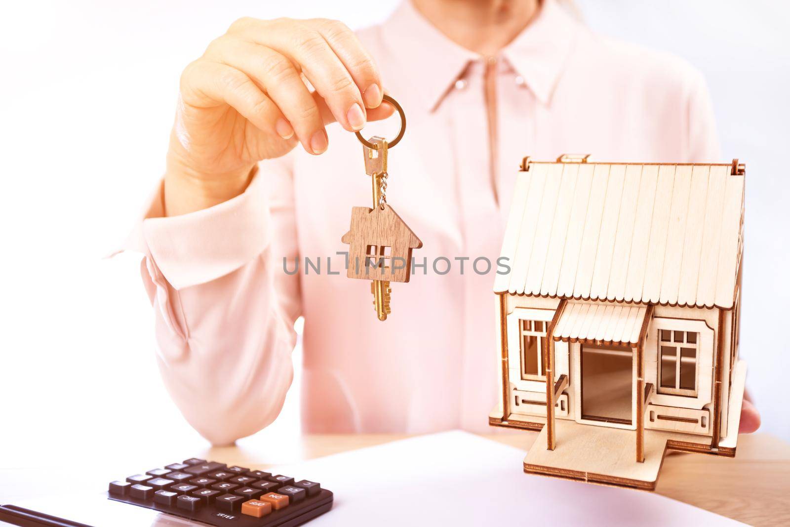 rental housing, realtor holds the key to the house.