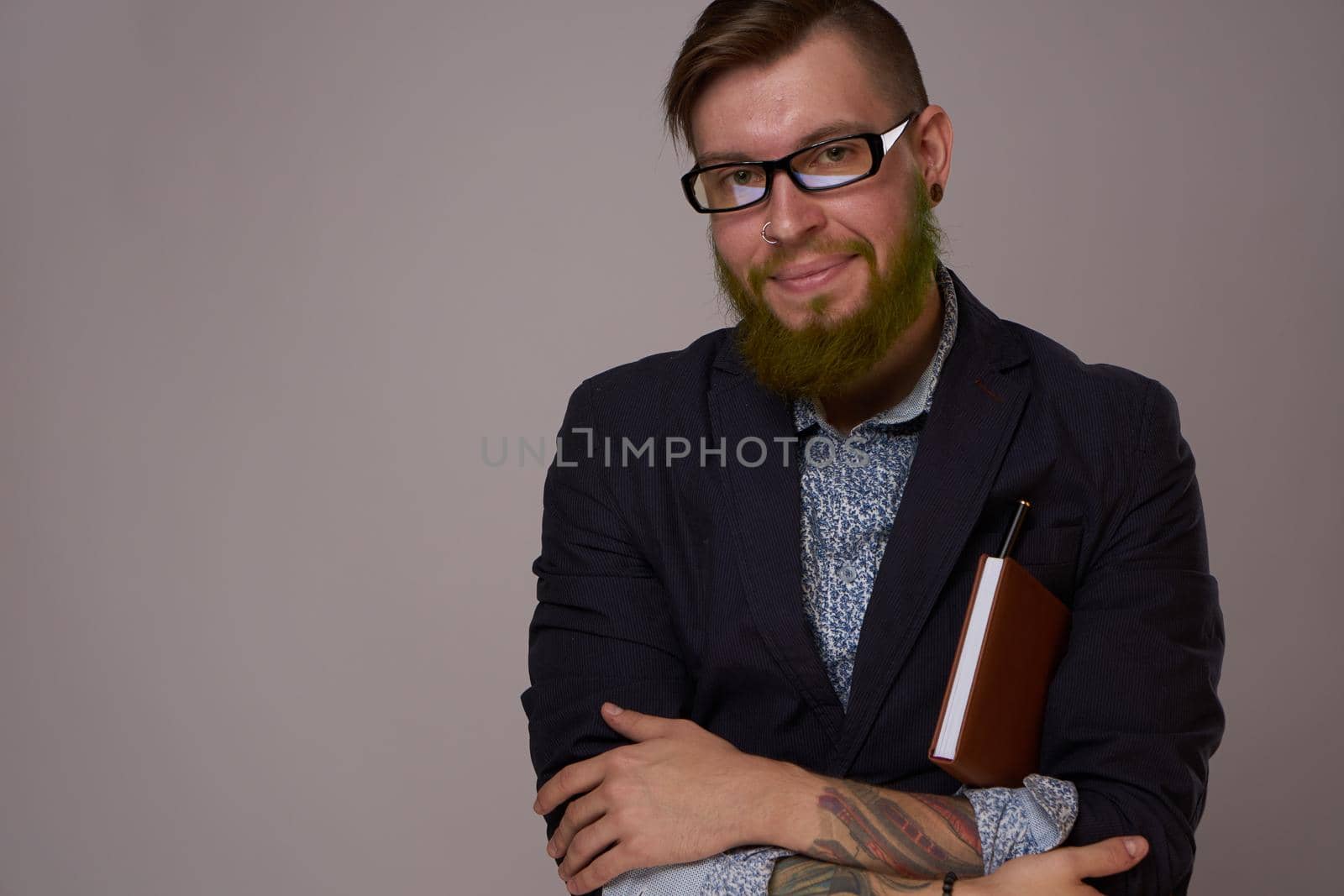 business man with glasses with tattoos on his arms office professionals by Vichizh