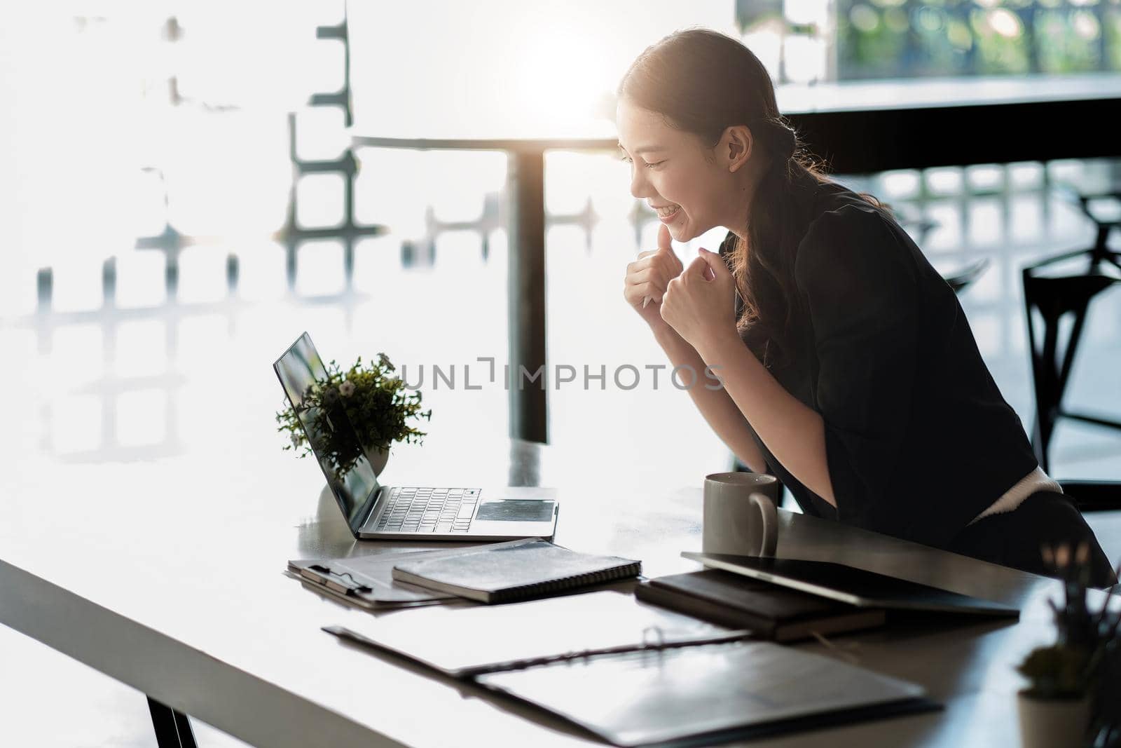 businesswoman celebrating business success achievement. Happy employee feeling motivated by good work, receive great news in email, positive exam results.