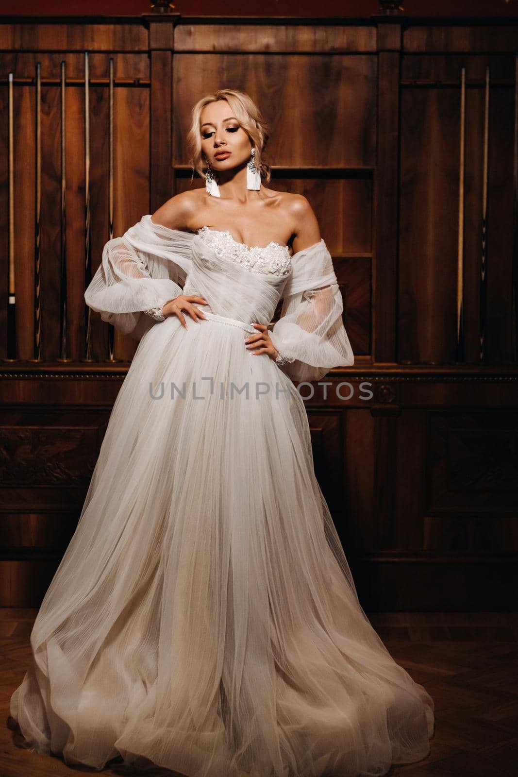 Portrait of beautiful bride in the hall.