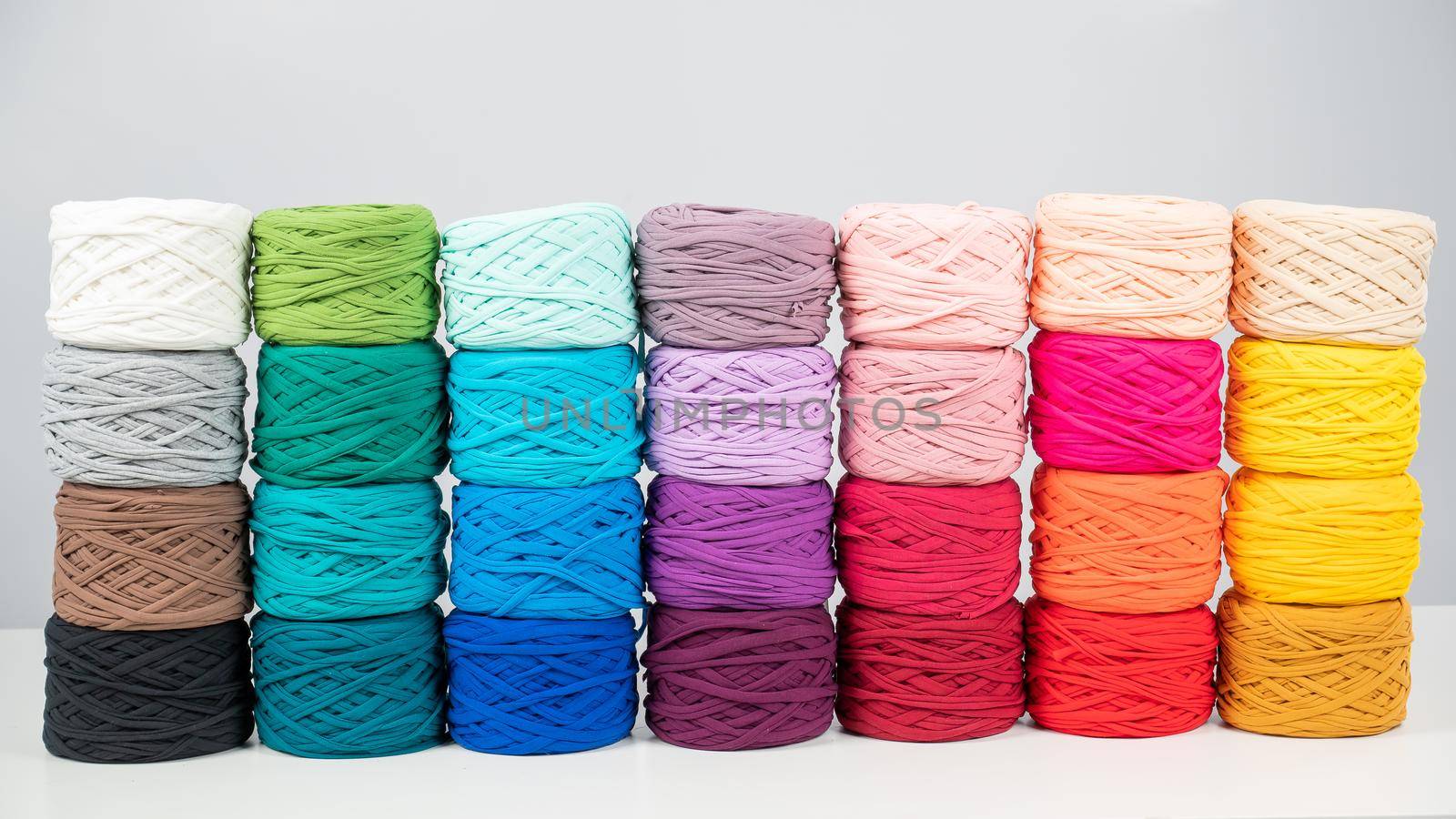 Rows of multicolored cotton yarn. The assortment of the store for needlework. by mrwed54