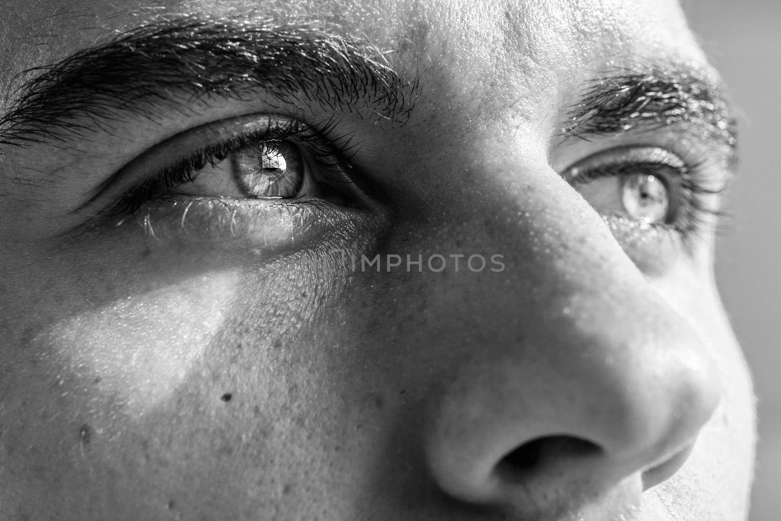 Macro shot of a young man's eye by javiindy