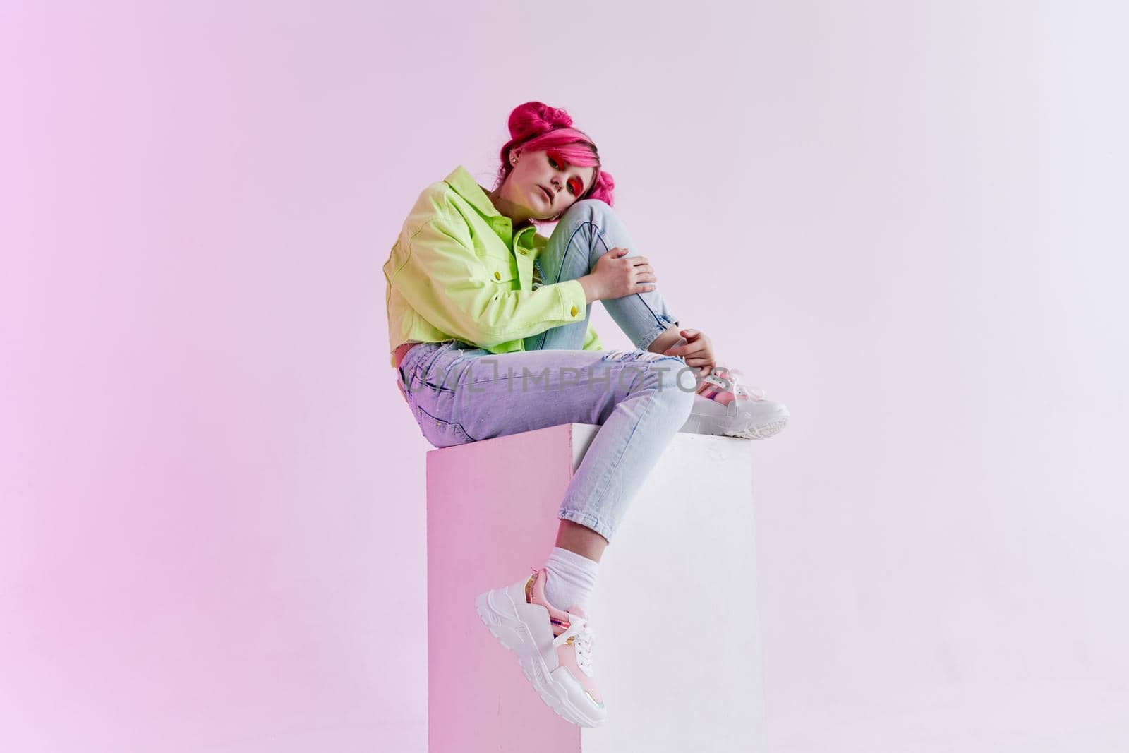fashionable woman pink hair posing fashion clothes lifestyle fun design. High quality photo