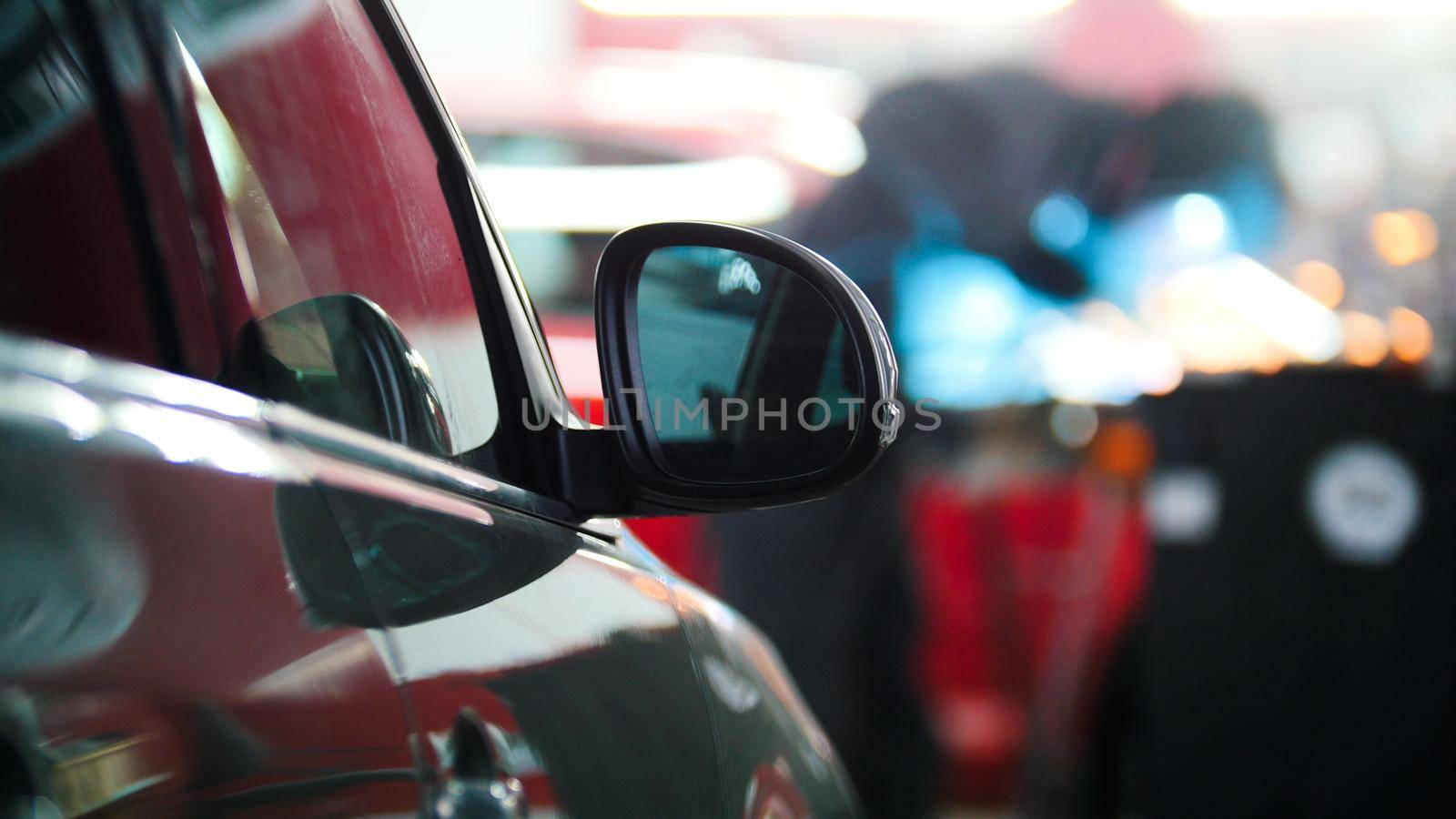 Blurred background - Welding repairing in car service, telephoto
