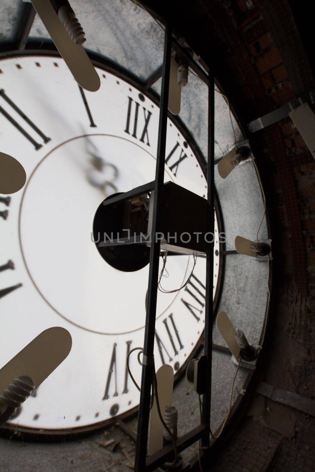 Clock face of old wall - mechanism inside, vertical by Studia72