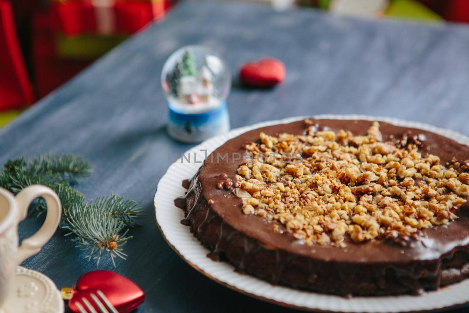 Panforte di Siena, Italian Christmas treat Gluten free christmas nut cake on a gray table with christmas decorations .