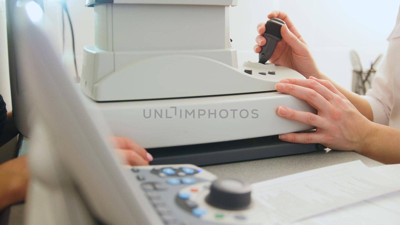 Medicine high technology - optometrist equipment in use - generic eye scanner machine by Studia72