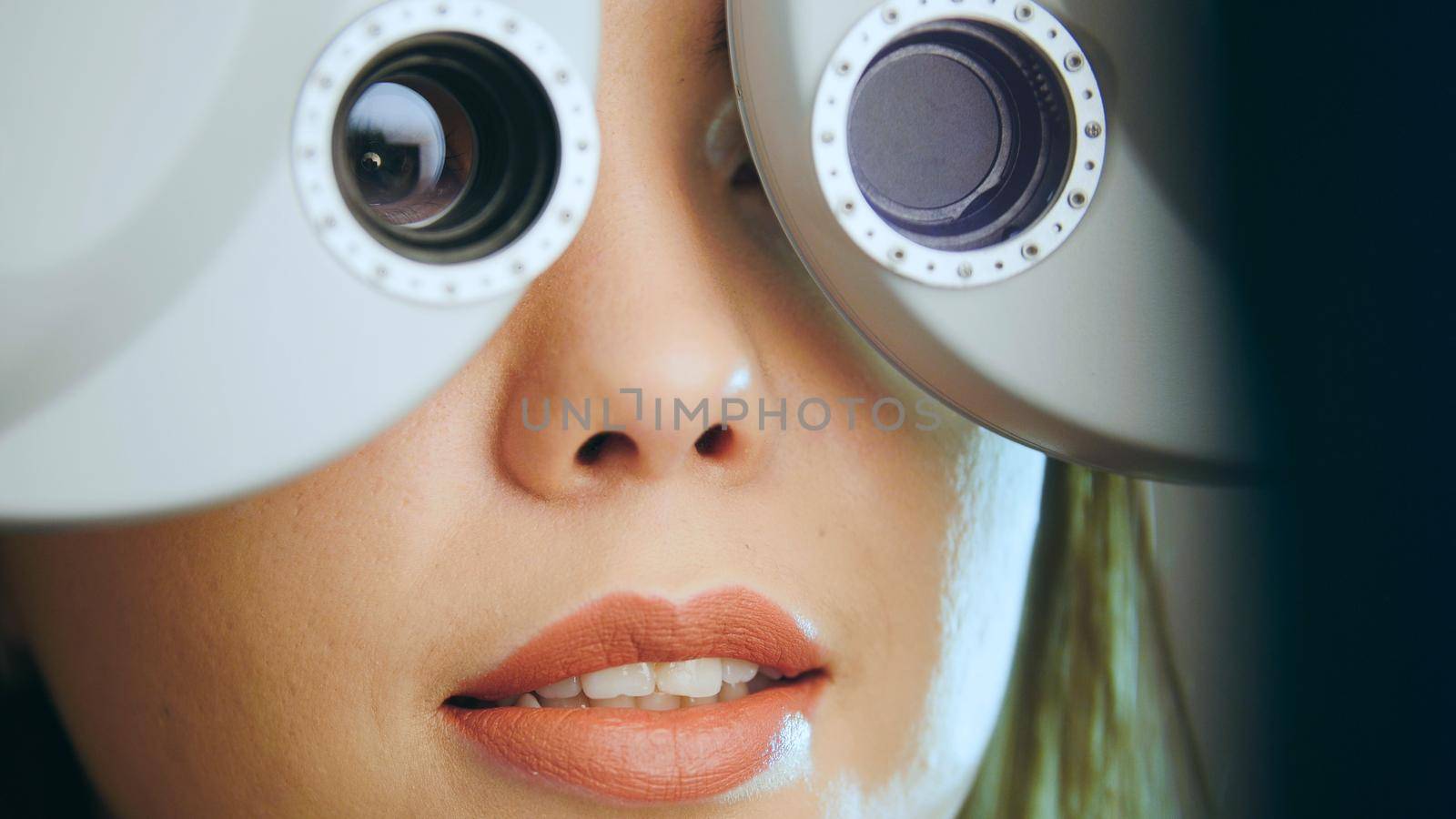 Ophthalmology - young woman checks the eyes on the modern equipment in the medical center by Studia72