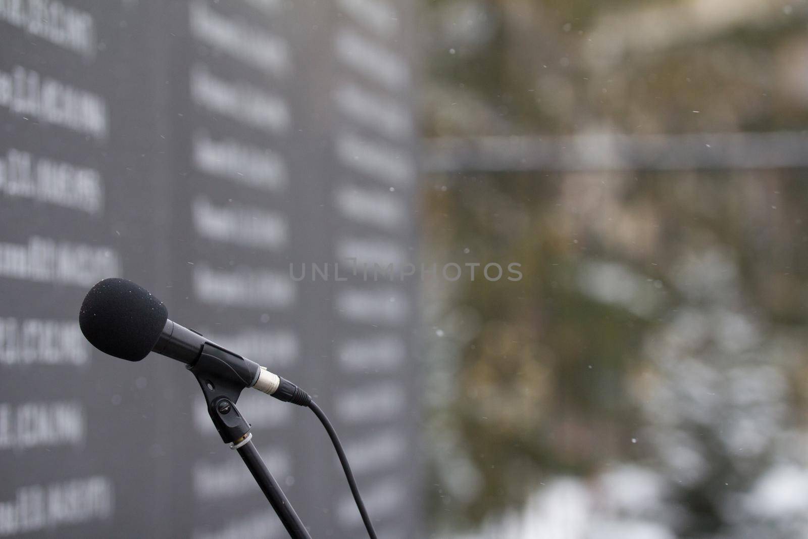 Close up of microphone in funeral ceremony, winter russia, telephoto