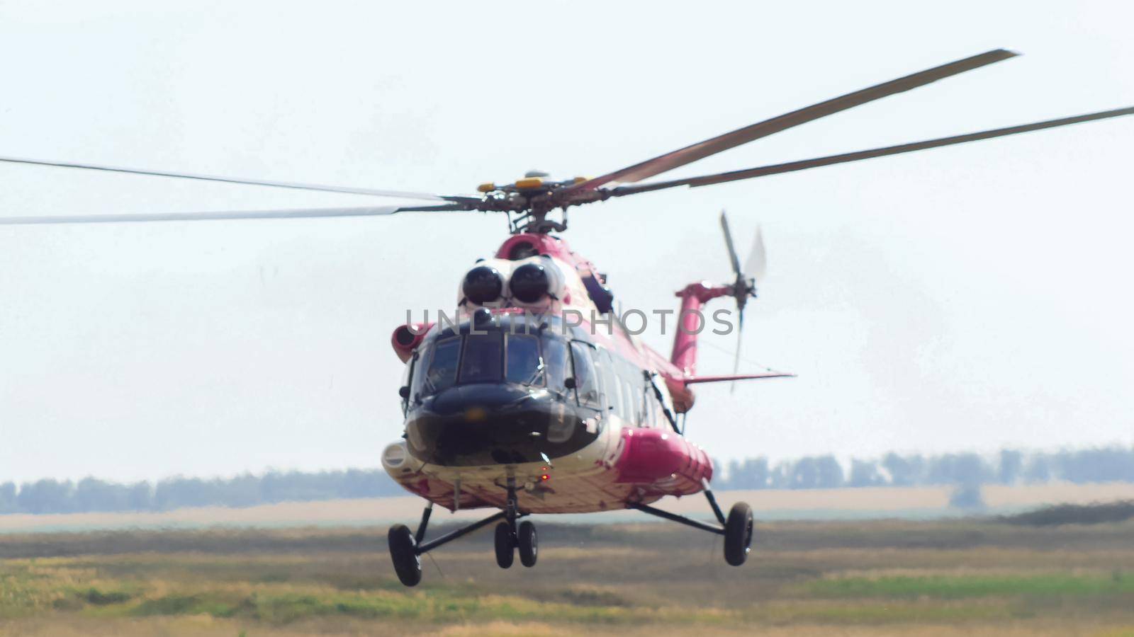 Modern emergency medicine helicopter take off at airfield by Studia72