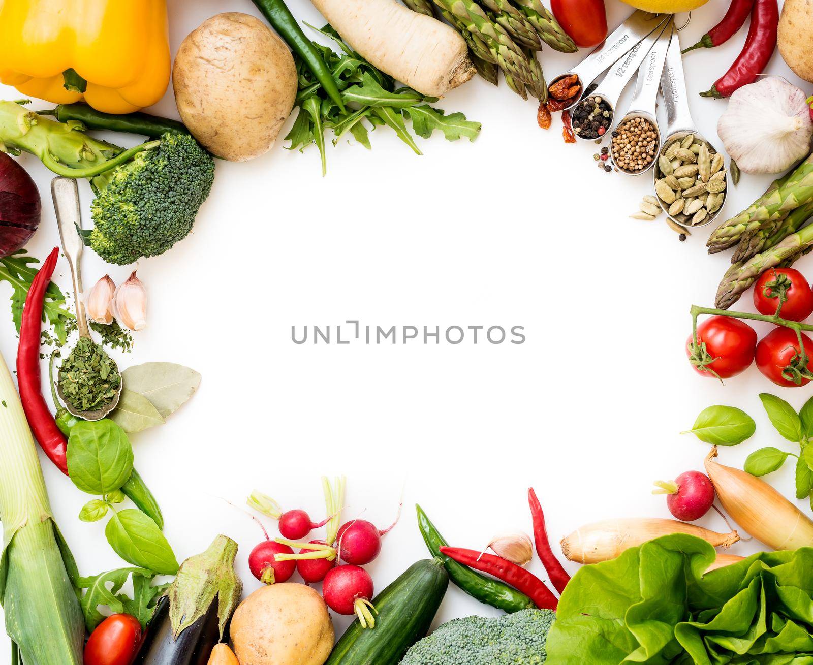 Frame of vegetables on a white background