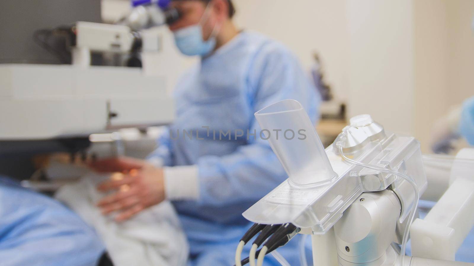 Surgical operations on the human eye - high technology health care equipment, de-focused
