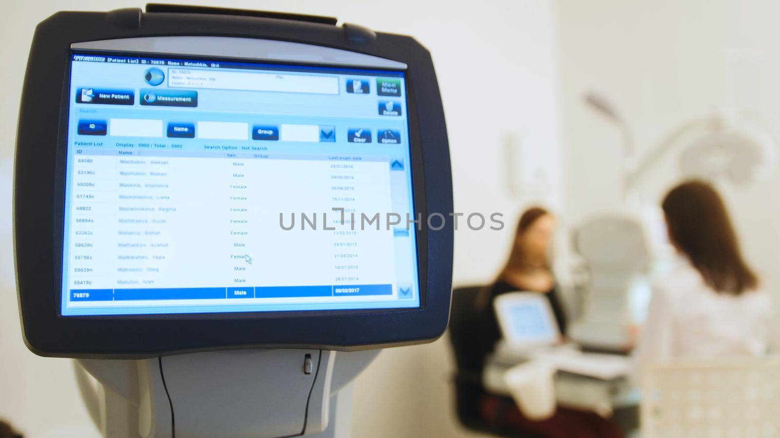 Ophthalmologist in eyes clinic doing diagnostic with vision of patient by modern computer systems - high technology health care, close up