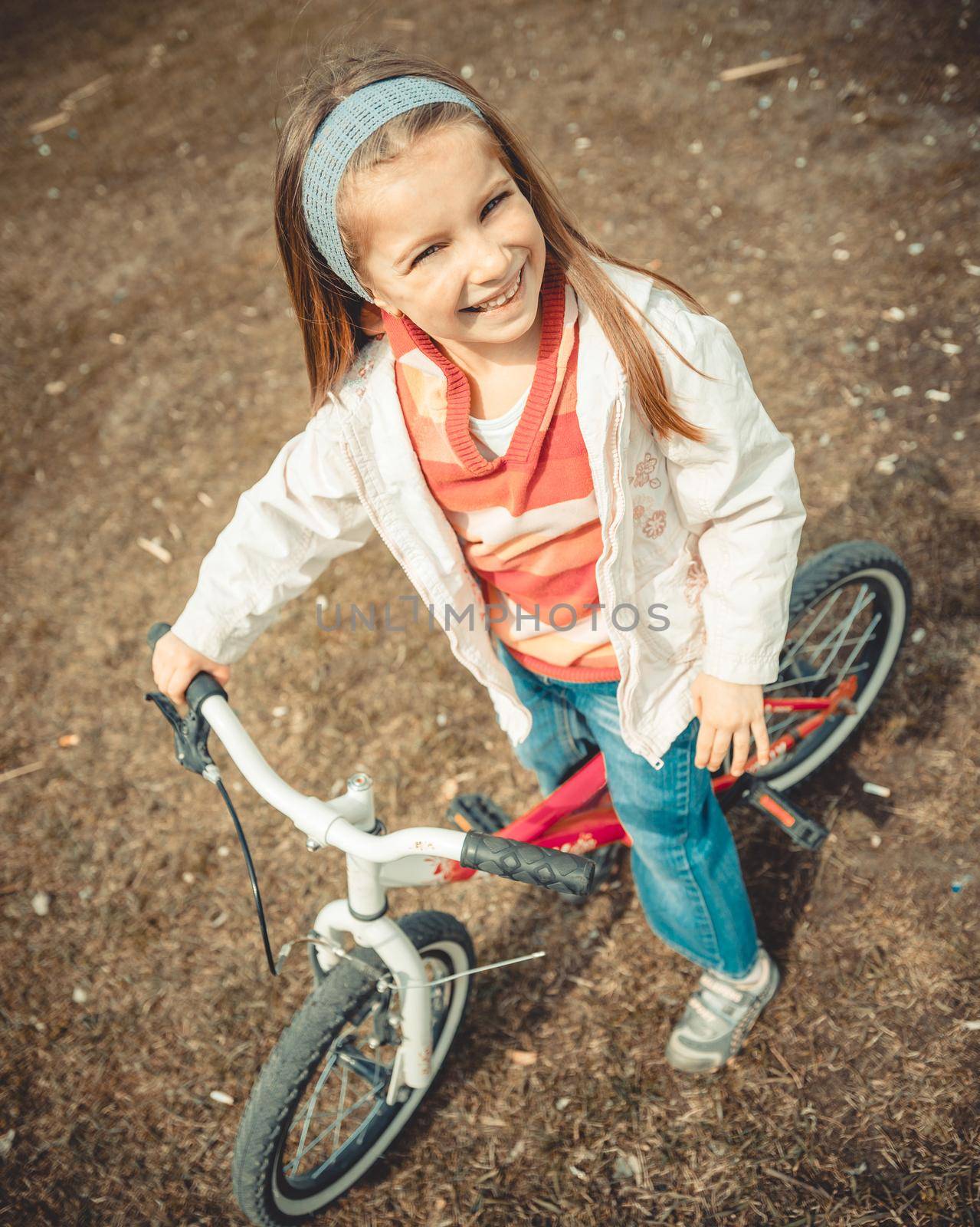 Little girl on a bicycle by GekaSkr