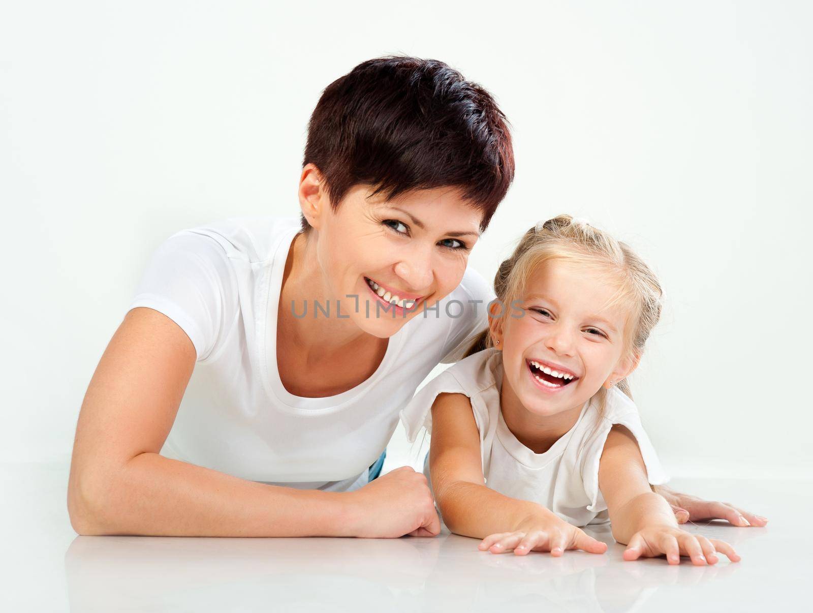 Mother and daughter laughing by tan4ikk1