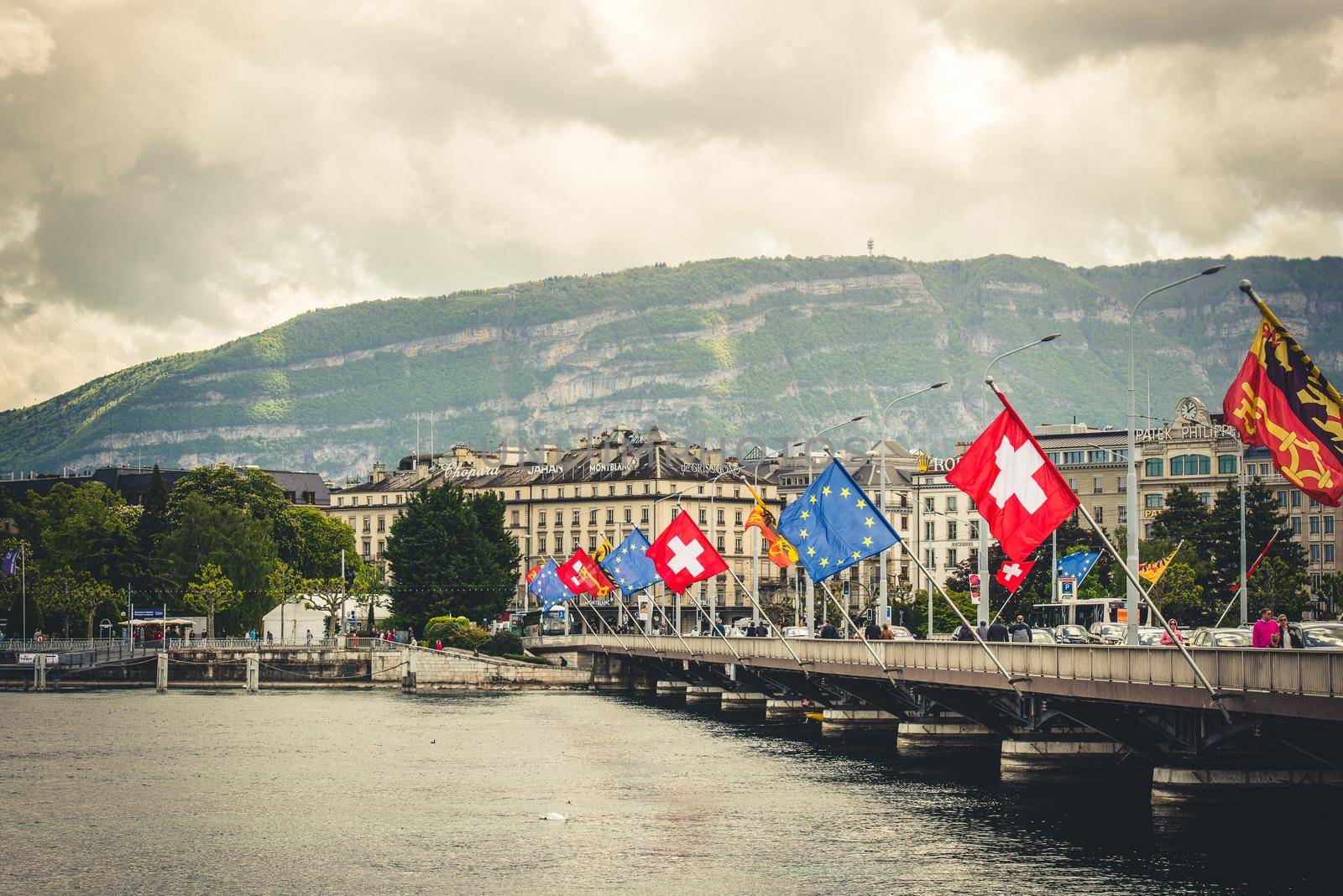 Geneve, Switzerland - 11 May 2014: bridge with the European flags in the center of Geneva, Switzerland