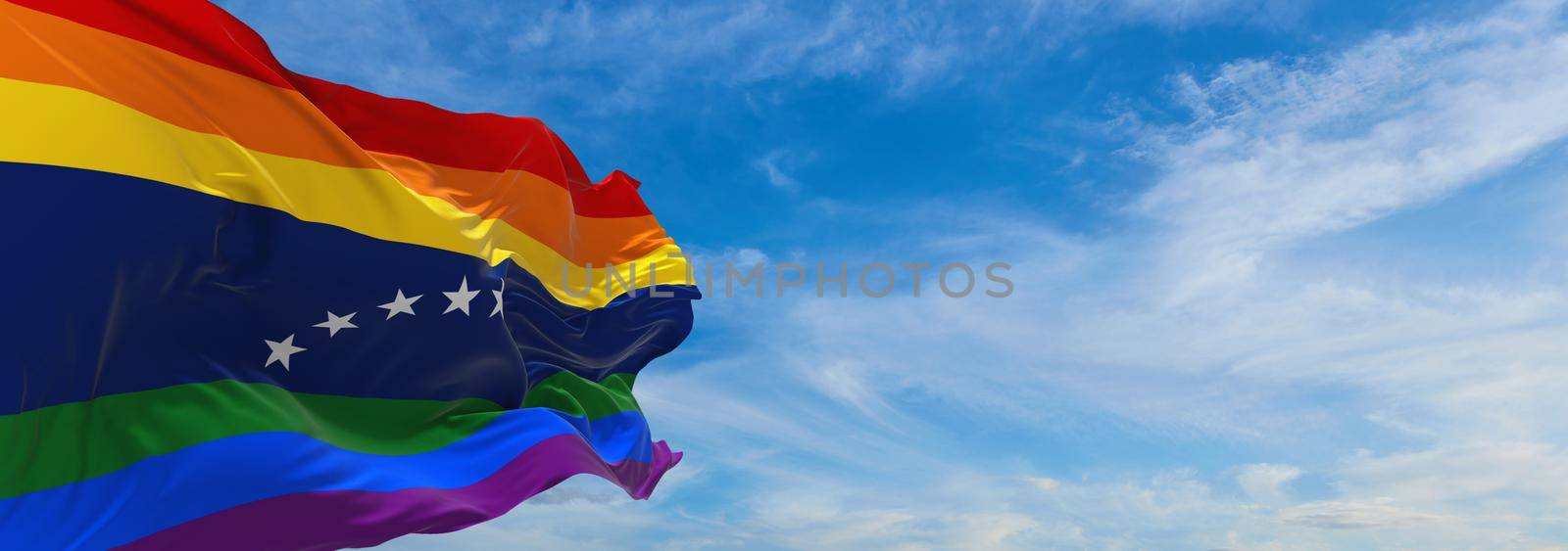 flag of Venezuela, Gay Pride waving in the wind at cloudy sky. Freedom and love concept. Pride month. activism, community and freedom Concept. Copy space by ErmolenkoMaxim