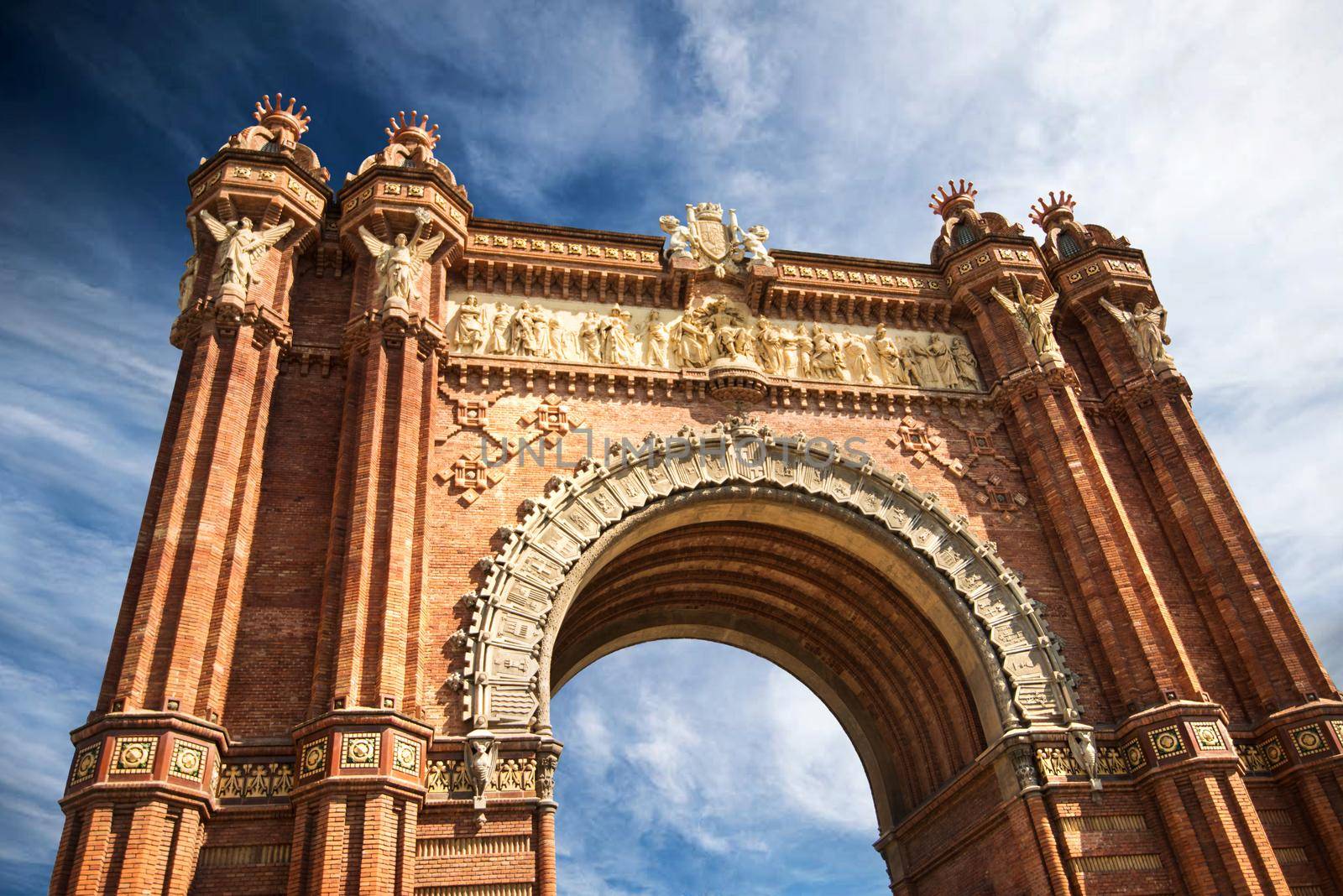 Beautiful Triumphal Arch of Barcelona against blue sky