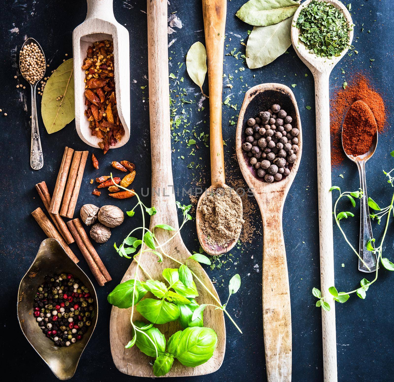 wooden spoons with spices and herbs by GekaSkr