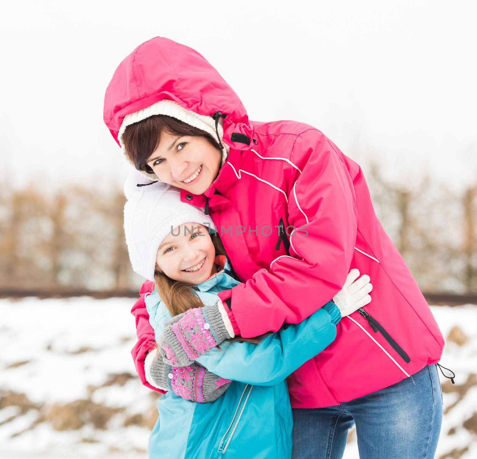 mother and daughter on a winter walk