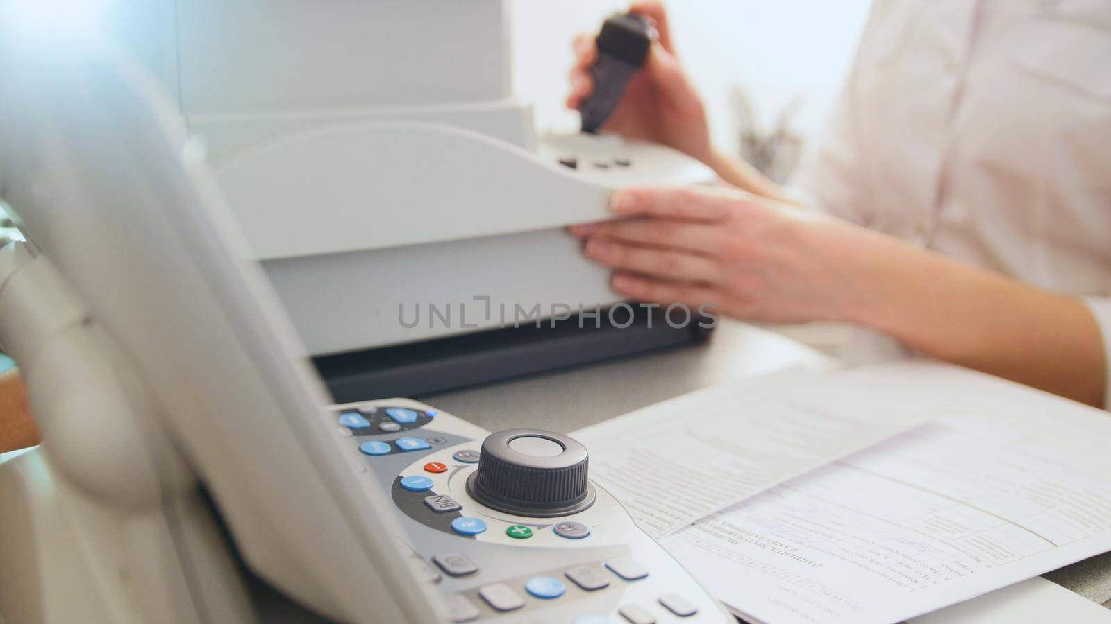 Optometrist equipment in use - generic eye scanner machine, close up