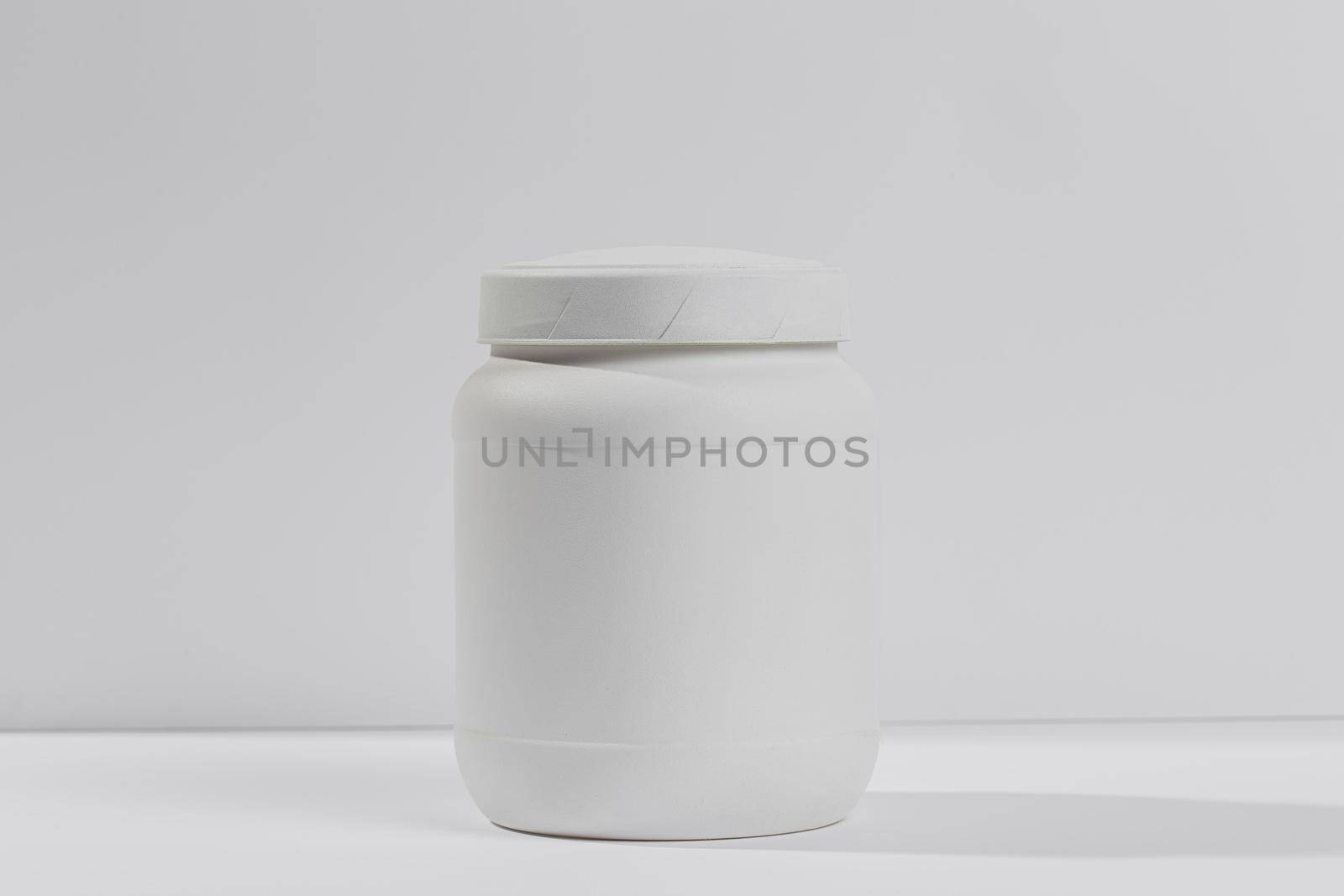 jar with gym supplements by Zahard