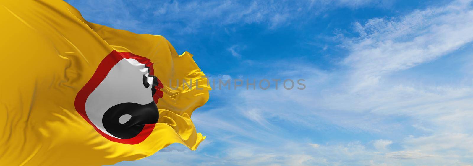 flag of Yinyang ren waving in the wind at cloudy sky. Freedom and love concept. Pride month. activism, community and freedom Concept. Copy space. 3d illustration