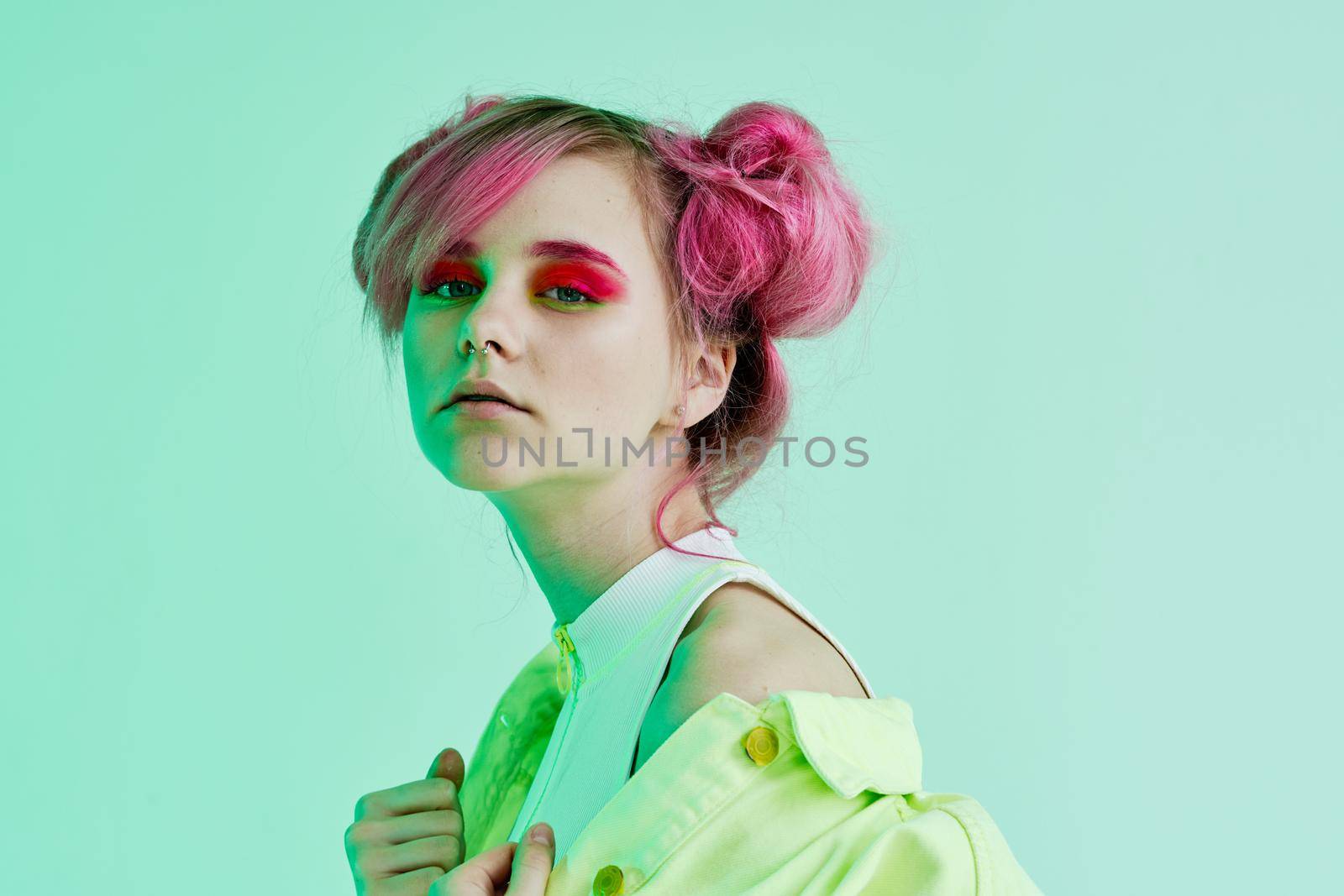girl with pink hair teen posing fashion neon. High quality photo
