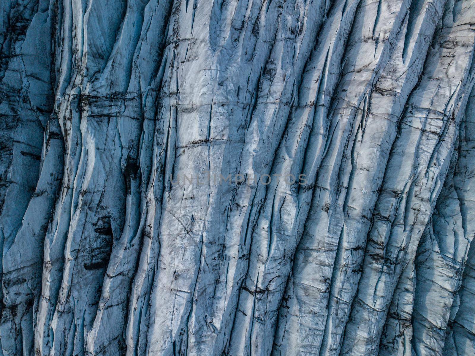 Svnafellsjkull Glacier in Iceland. Top view. Skaftafell National Park. Ice and ashes of the volcano texture landscape, beautiful nature ice background from Iceland