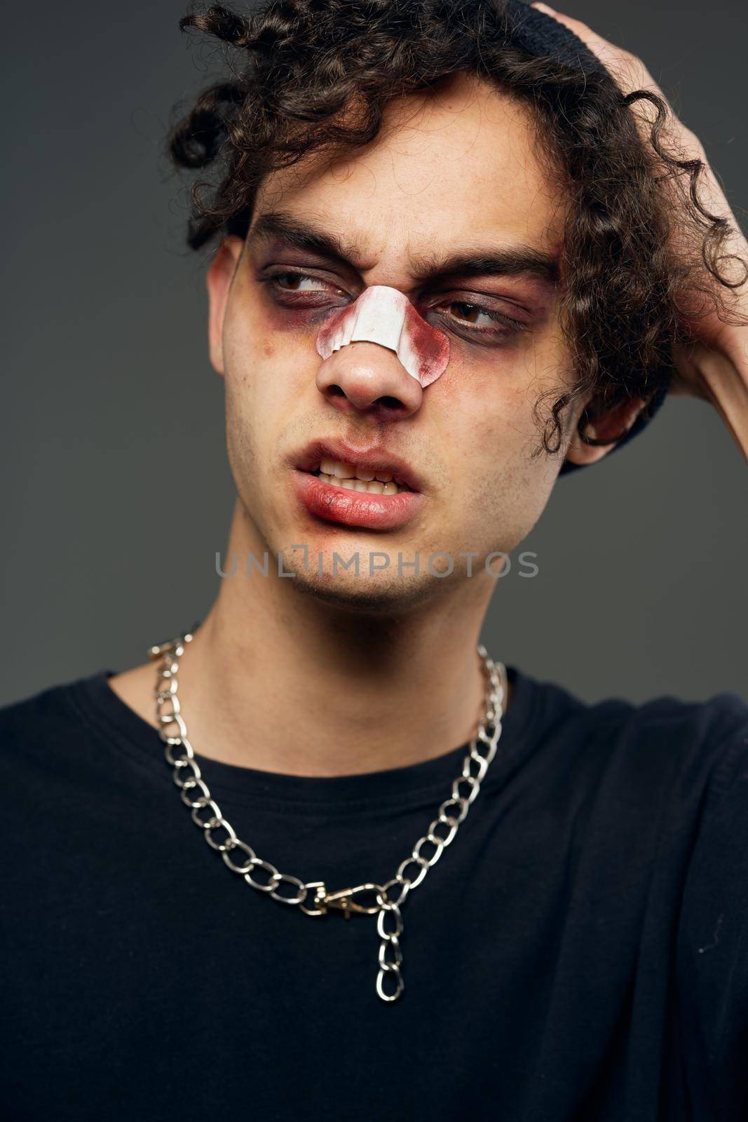 boxer training broken face the dark background fighter. High quality photo