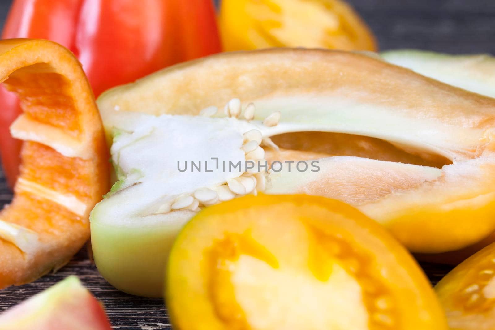 half-sliced peppers in the kitchen, cooking snacks and pepper salad