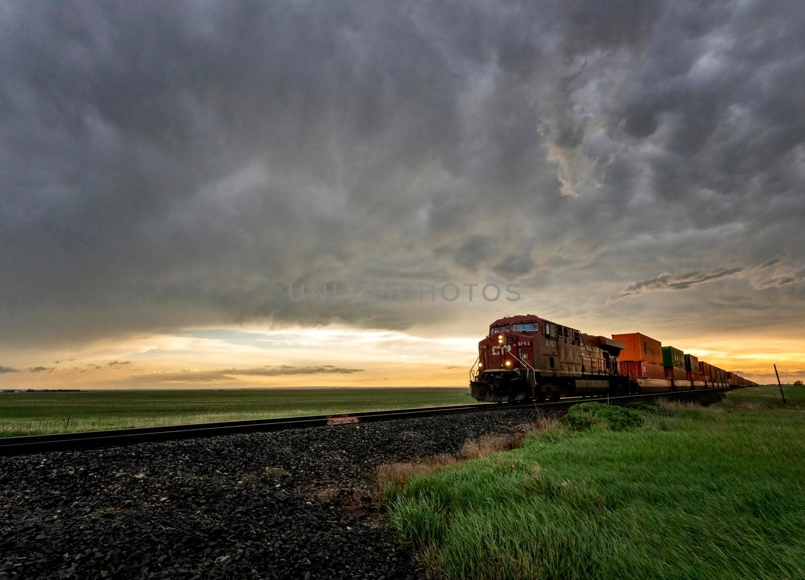 Prairie Storm Clouds in Saskatchewan Train Foreground