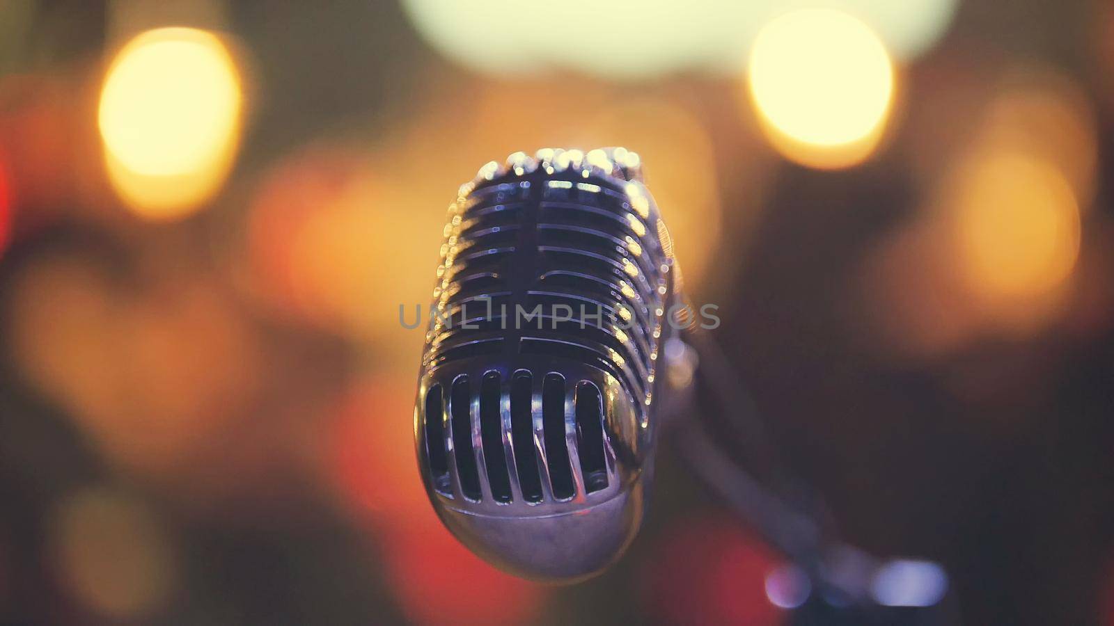 Vocal microphone at concert scene, close up