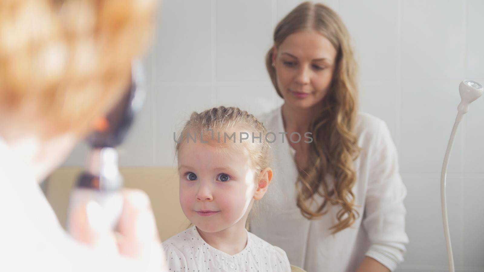 Child's ophthalmology - check up of eyesight - optometrist diagnosis little girl by Studia72