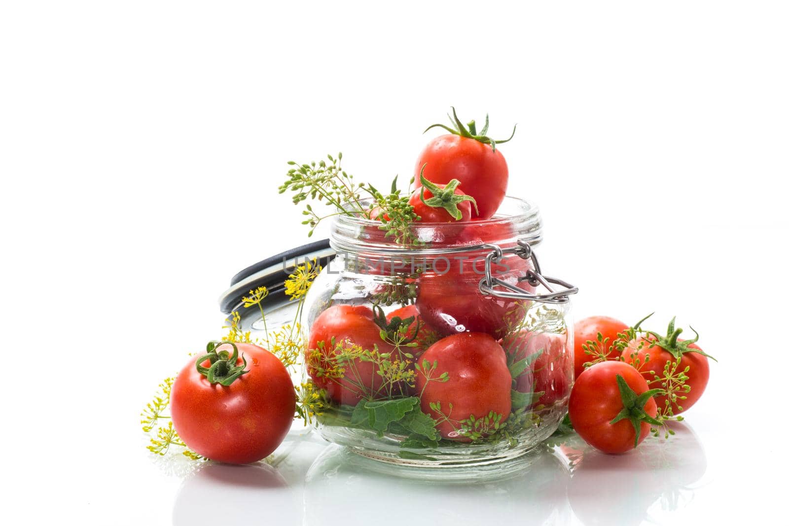 fresh natural tomatoes with spices prepared for conservation, isolated on white background