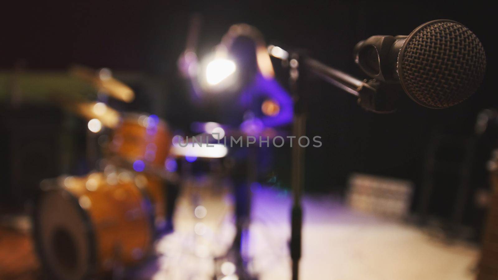 Teen rock music - passionate girl percussion drummer perform music break down, de-focused, wide angle