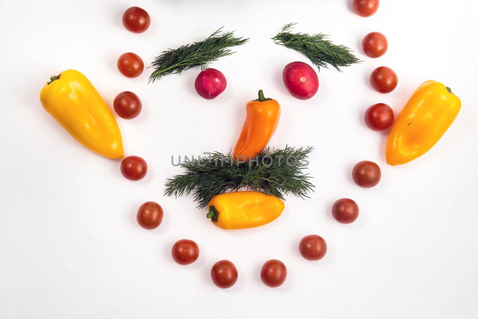 The face of a man made of sliced vegetables on a white background by Lobachad