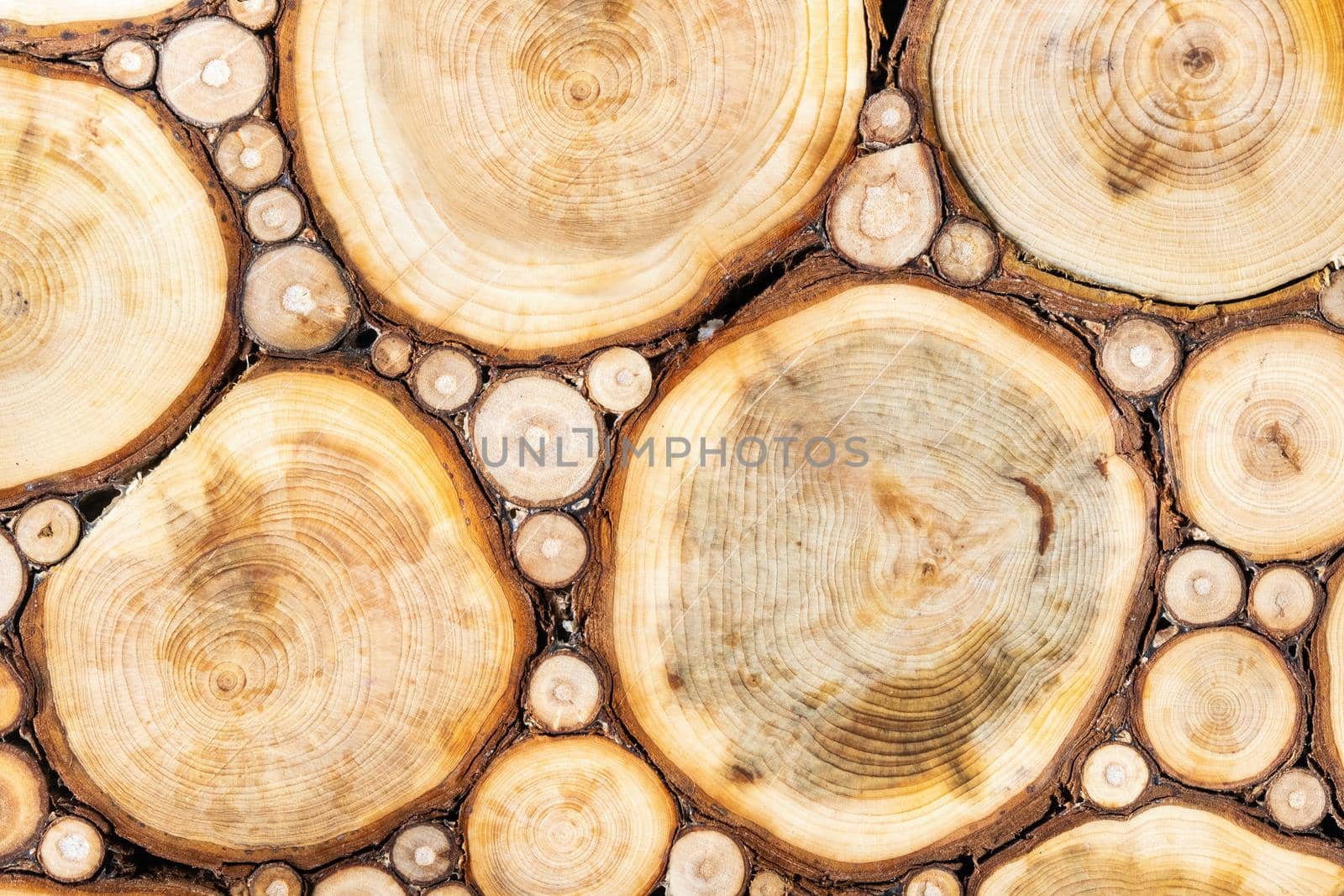 background of a wooden section of a bar.The texture of a wooden log house by Lobachad