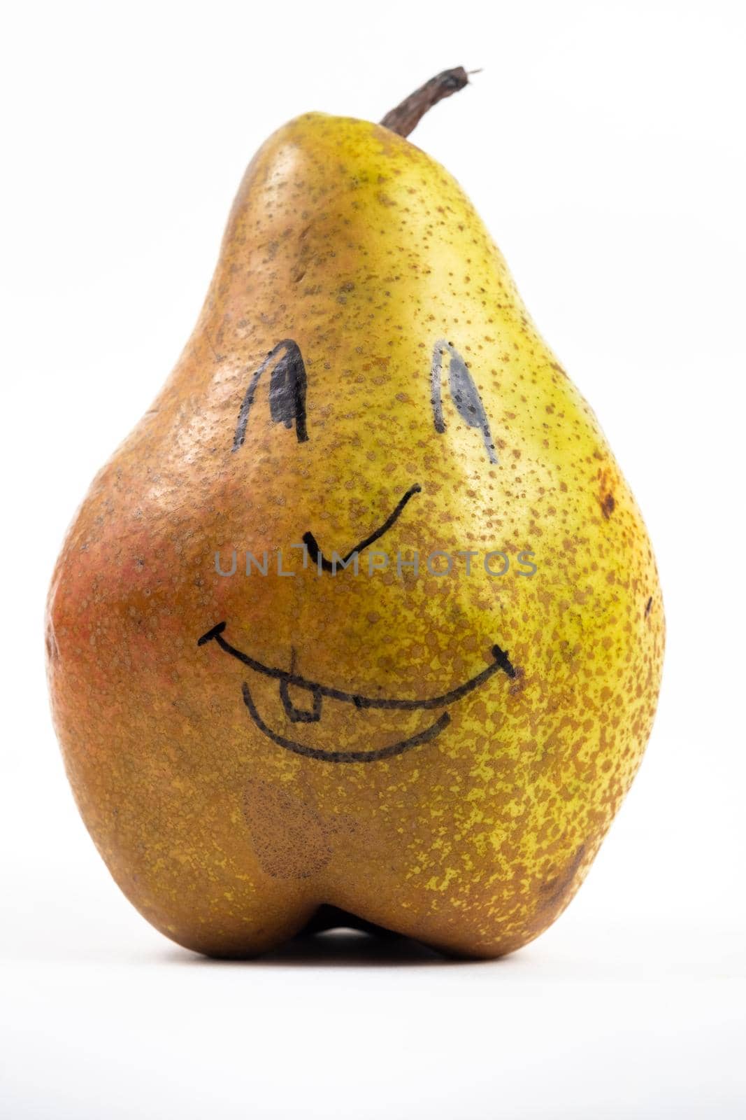 A large pear with a painted smiley face on a white isolated background by Lobachad