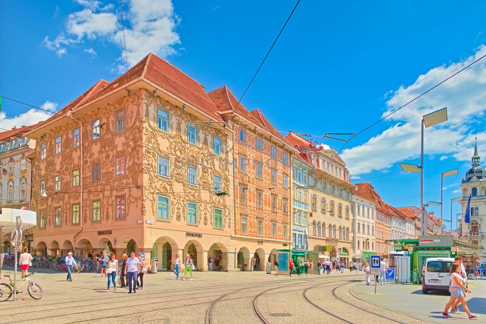 Graz - June 2020, Austria: View of the city center of Graz with tram lines, tram station and beautiful old buildings in the traditional architectural style