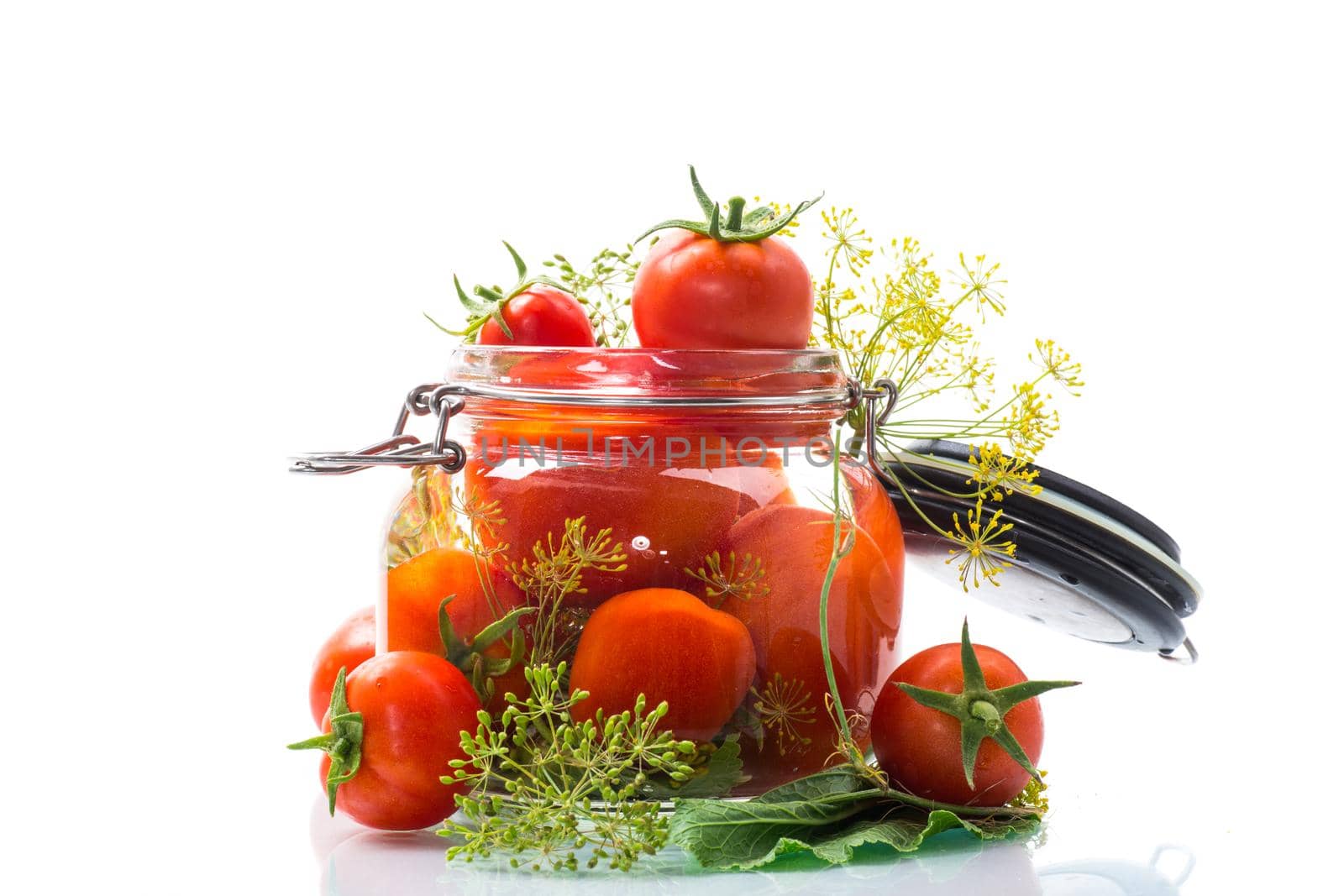 fresh natural tomatoes with spices prepared for conservation, isolated on white background